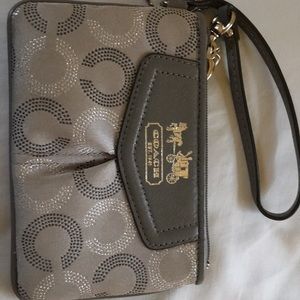 Coach wristlet classic C logo.